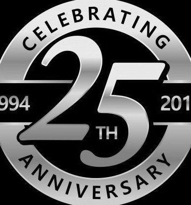 Silver 3D number 25 inside a circular anniversary emblem on black background
